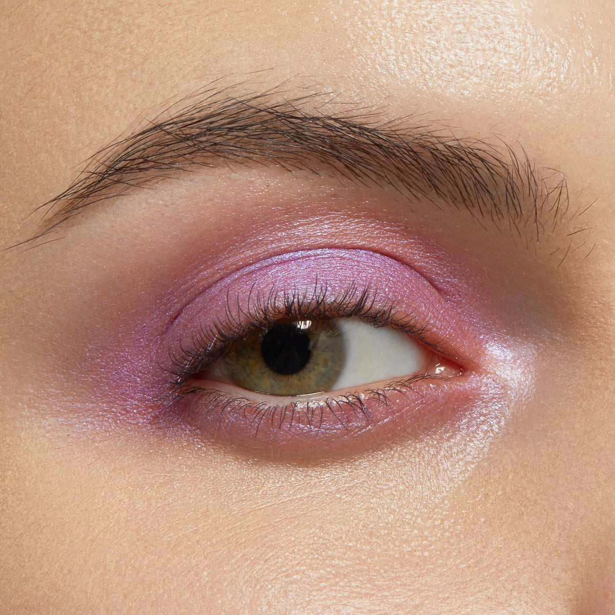 Close-up of ColourPop Shadow Stix Juicy Gossip metallic pink shade