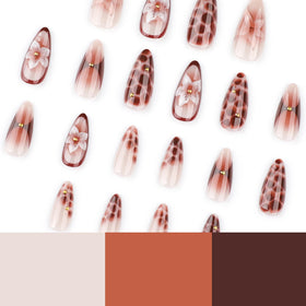 Close-up of CTTHNBD almond press on nails showing floral pattern