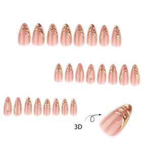 Close-up of CTTHNBD almond press on nails showing gold stripes