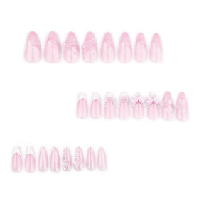 Close-up of CTTHNBD almond press on nails with flower design