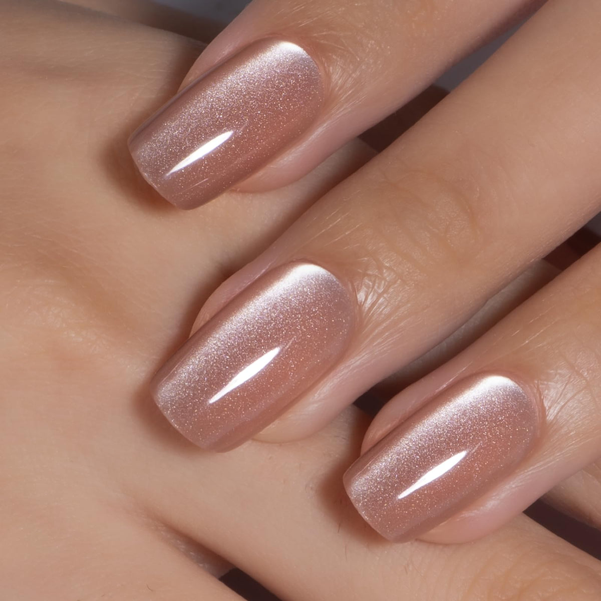 Close-up of CurvLife glossy nude cat eye press on nails