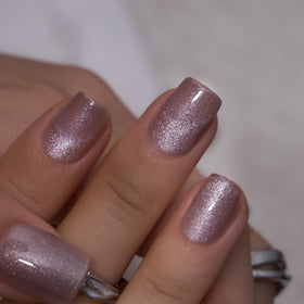 Close-up of CurvLife press on nails showing detailed gel patterns