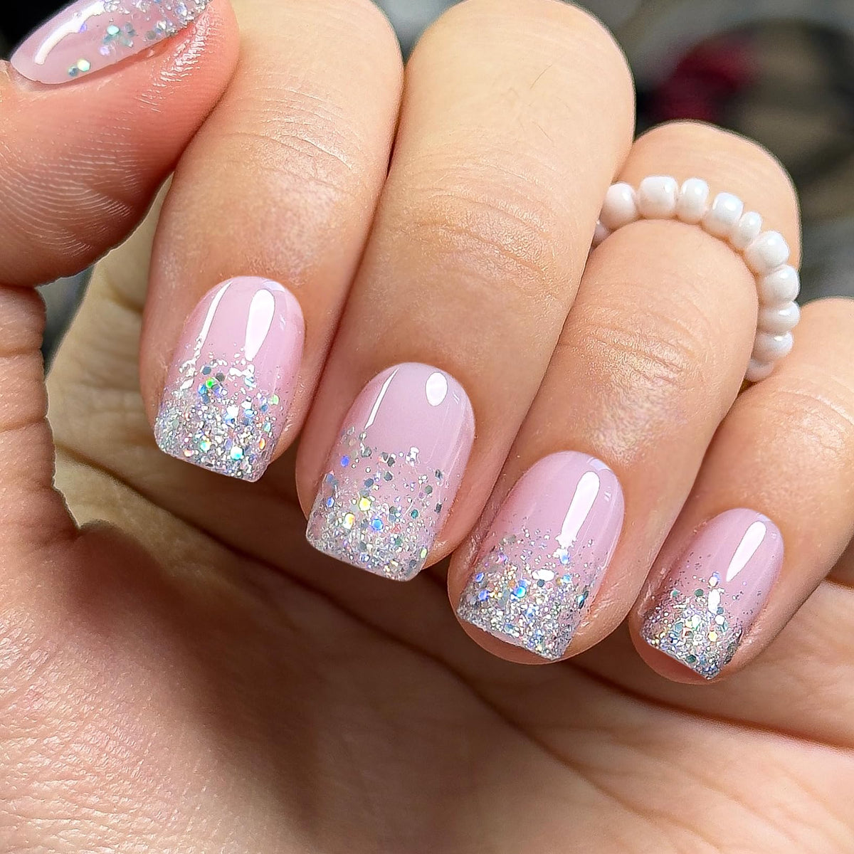 Close-up of CurvLife Short Press On Nails showing gel finish