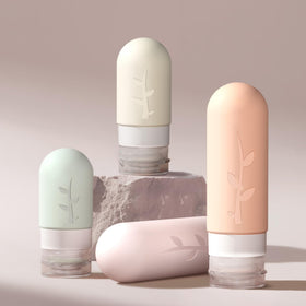 Close-up of DEPOZA travel bottles showing leak-proof design