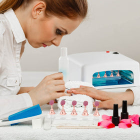 Close-up of Difenni Nail Stand with adhesive putty