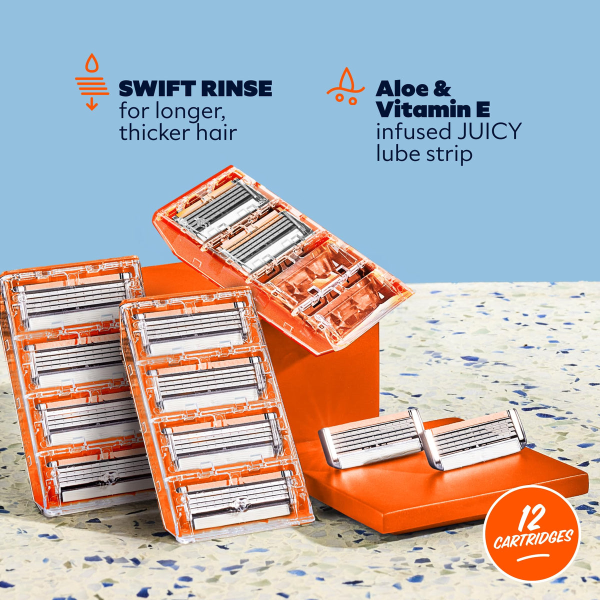 Close-up of Dollar Shave Club razor blade with JUICY Lubricant Strip