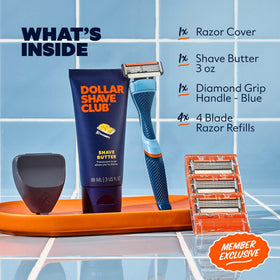 Close-up of Dollar Shave Club razor with 4 blade refills