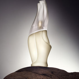 Close-up of Donna Karan Cashmere Mist Purse Spray bottle