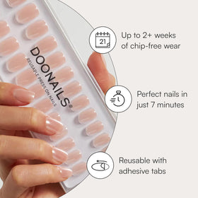 Close-up of Doonails adhesive tabs and rosewood cuticle stick