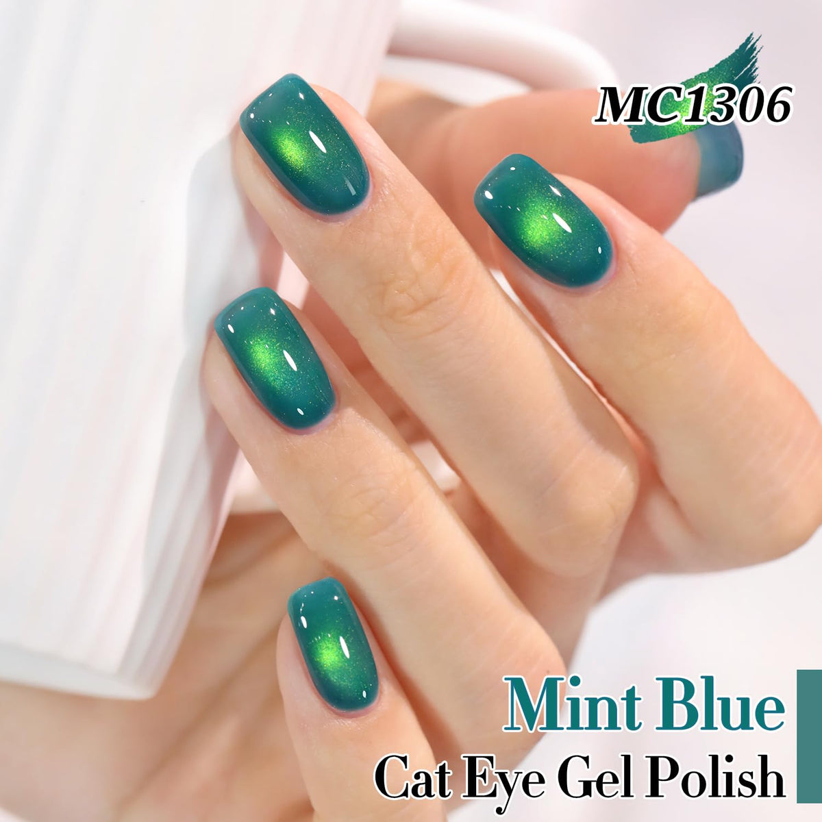 Close-up of Double Rhythm Cat Eye Gel Polish Mint Blue with holographic glitter