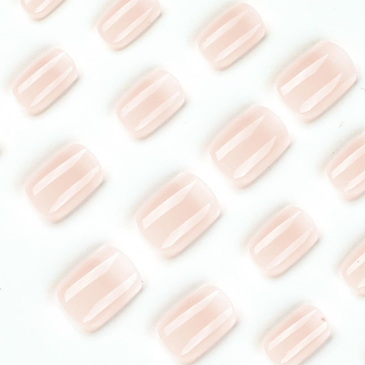 Close-up of DZPGUONIZ short square press on nails in nude colour