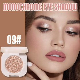 Close-up of FeiCuiYun eyeshadow palette with light brown and pearl white shades