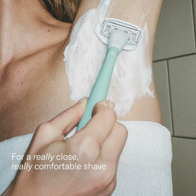 Close-up of Flamingo razor handle with ergonomic design