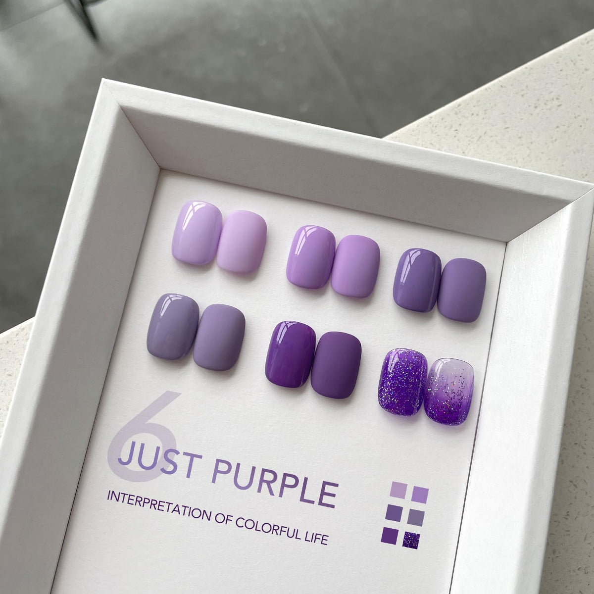 Close-up of GAOY gel nail polish colours in purple shades