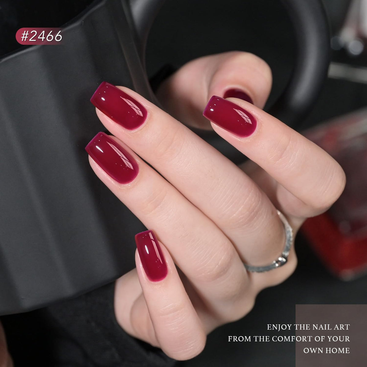 Close-up of GAOY gel polish bottles showing glossy and matte finishes