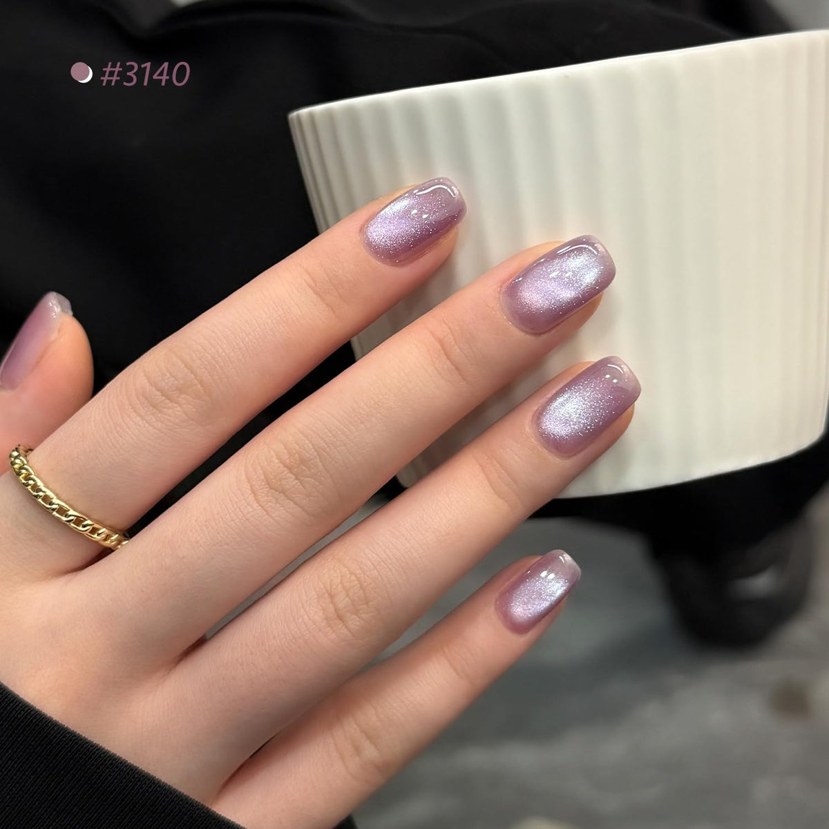 Close-up of GAOY Glitter Cat Eye Gel Nail Polish in purple