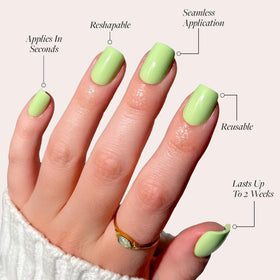 Close-up of Glamnetic Press On Nails Light Sage with storage box