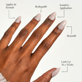 Close-up of Glamnetic Short Almond Glossy nails in light blush pink