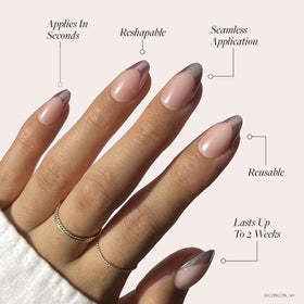Close-up of Glamnetic Short Almond nails with metallic pink tips