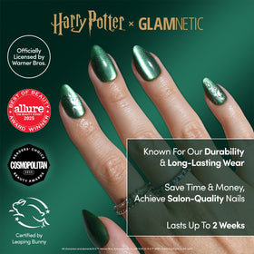 Close-up of Glamnetic Slytherin Press On Nails showing silver foil serpent design