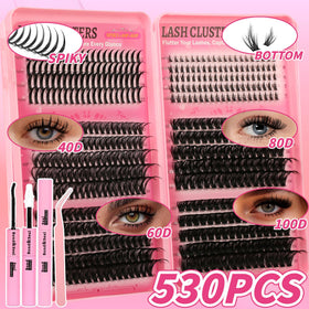 Close-up of Gmagictobo lash tweezers included in the kit