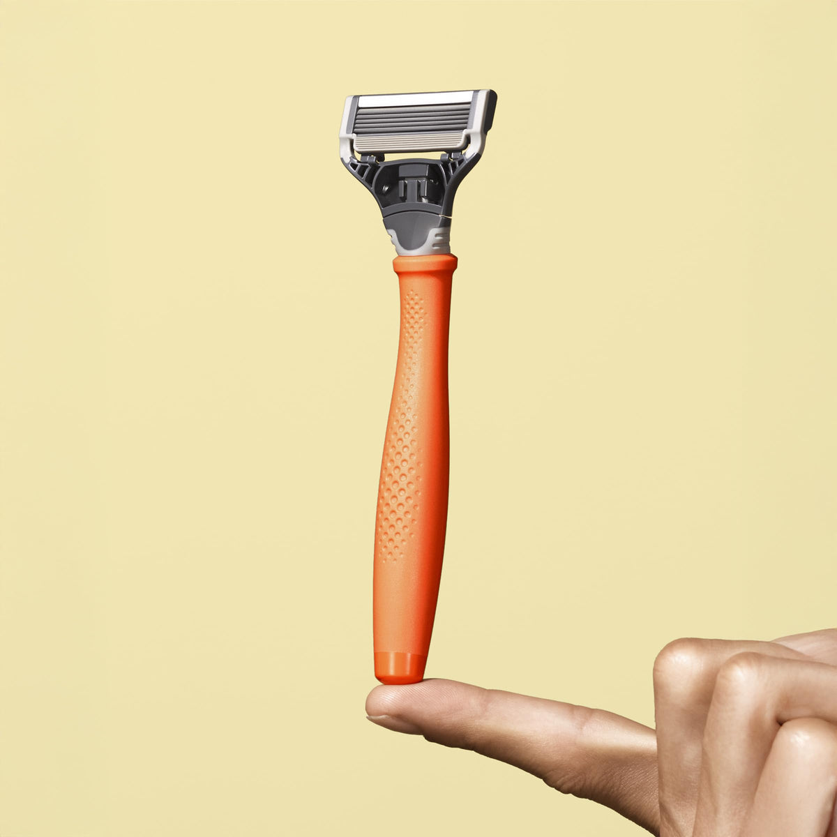 Close-up of Harry's razor blade showing five blades and precision trimmer