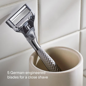 Close-up of Harry's Winston razor handle with ergonomic grip