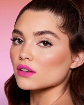 Close-up of hot pink lipstick tube from MAKI YIKA