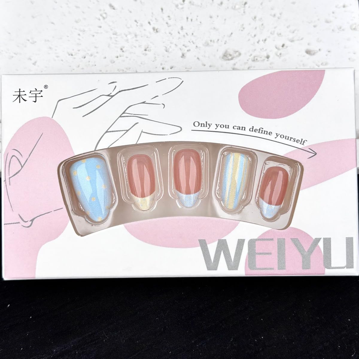 Close-up of HPYFOI Short Almond Press On Nails showing polka dot design