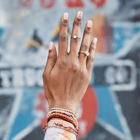 Close-up of imPRESS nails with glitter and 3D crystals