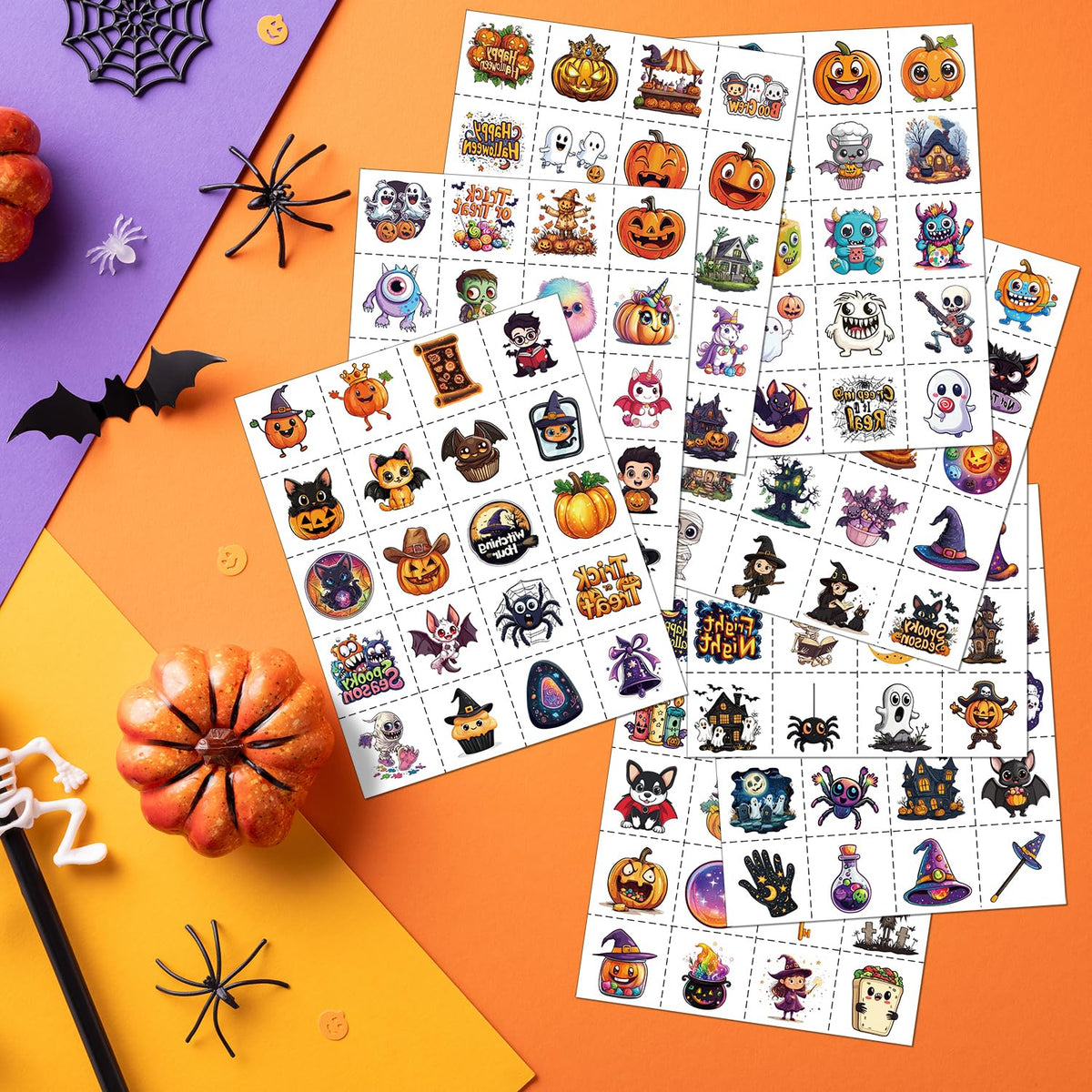 Close-up of JCFIRE Halloween temporary tattoos on a perforated sheet