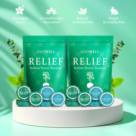 Close-up of JoJowell shower steamers in mint and eucalyptus scents