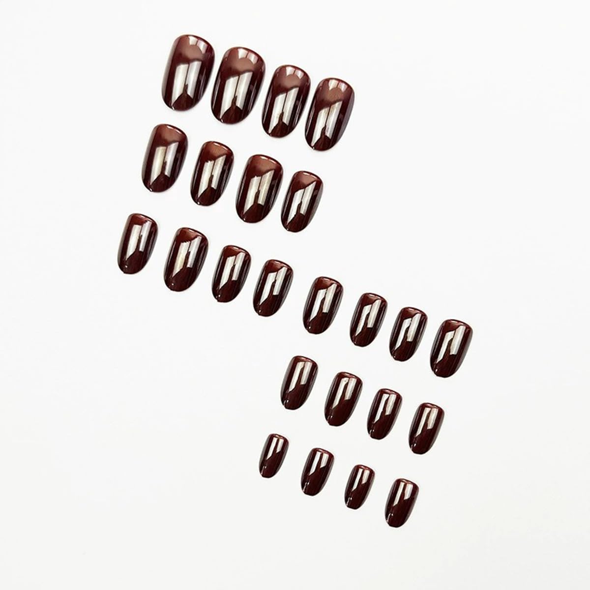 Close-up of juggssa acrylic fake nails in almond shape