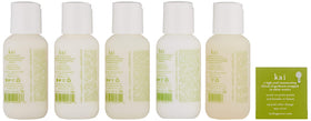 Close-up of kai shampoo and conditioner bottles in travel set