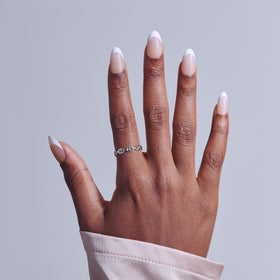 Close-up of KISS Press On Nails 'Curiosity' showing white tips