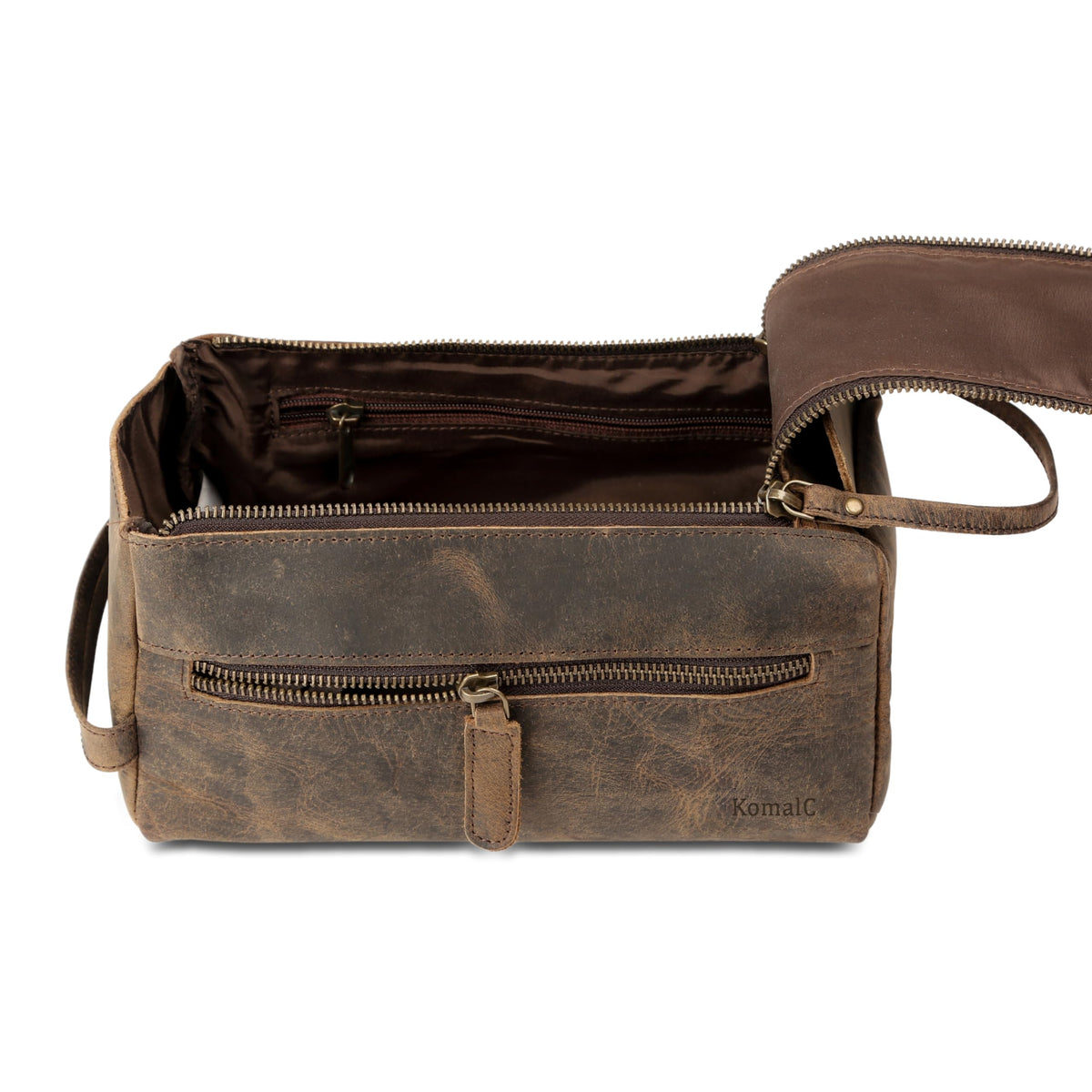Close-up of KomalC leather toiletry bag craftsmanship