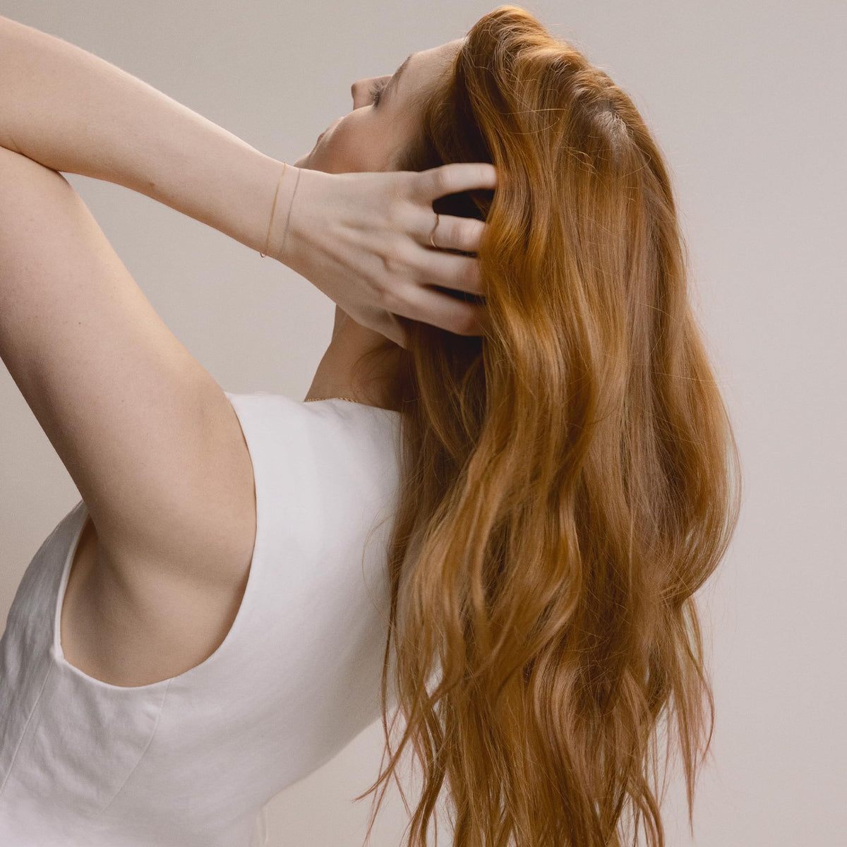 Close-up of Kristin Ess Soft Shine Beach Wave Hair Spray nozzle