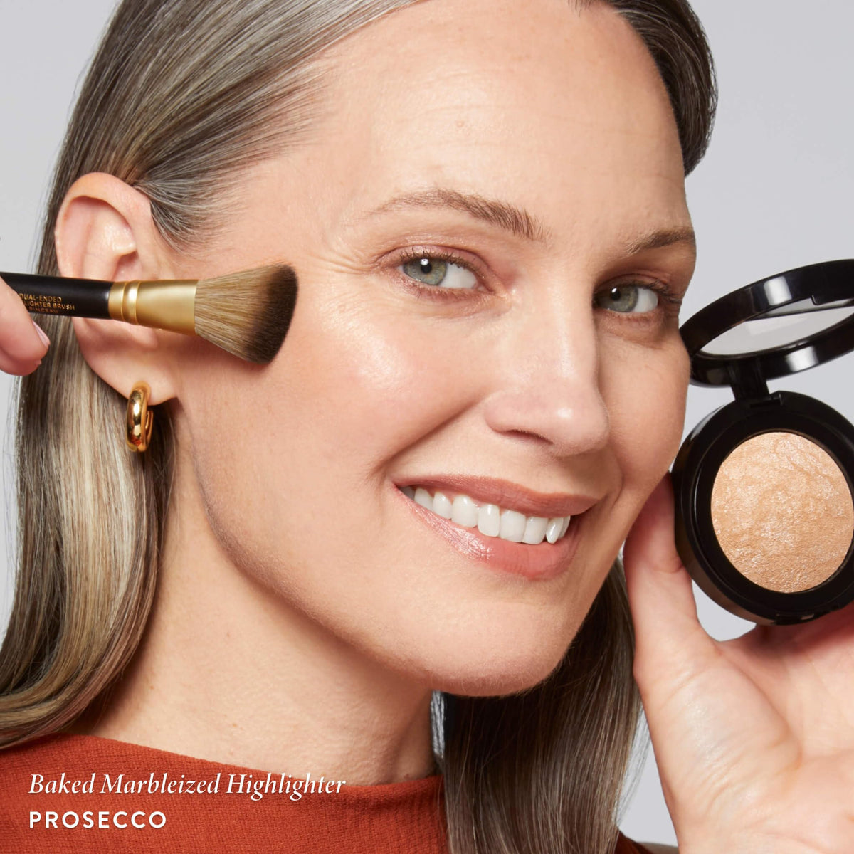 Close-up of LAURA GELLER Baked Marbleized Highlighter texture
