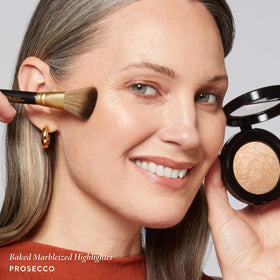 Close-up of LAURA GELLER Baked Marbleized Highlighter texture