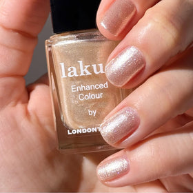 Close-up of LONDONTOWN Lakur Nail Polish Isla Bonita gold shimmer