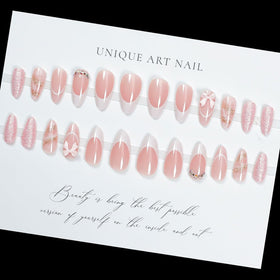 Close-up of LPOODDNU press on nails with 3D bow diamond glitter