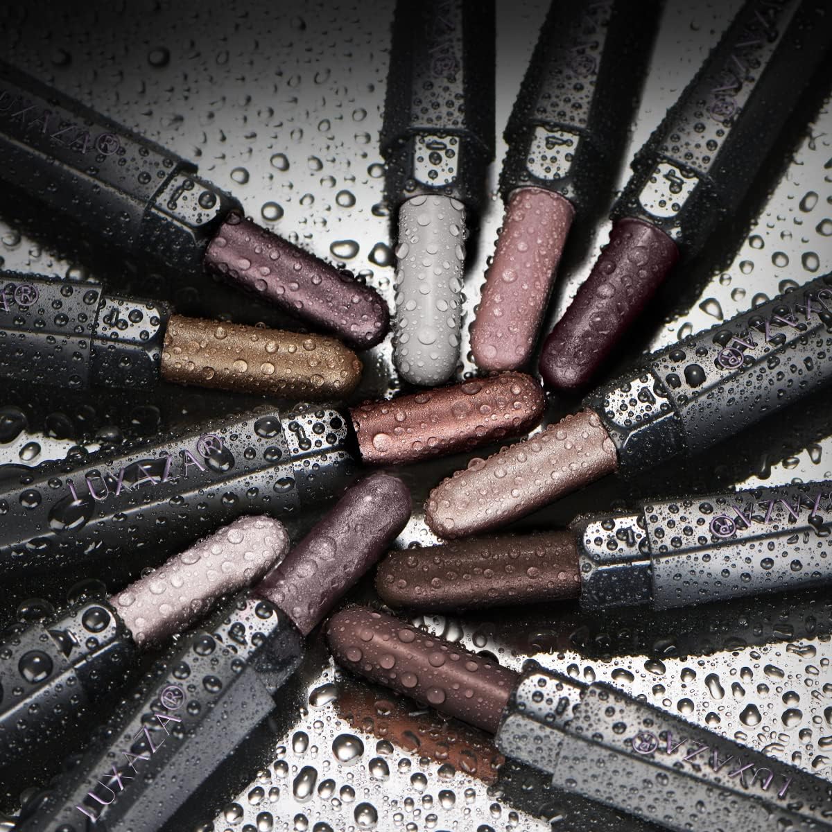 Close-up of LUXAZA PRO creamy eyeshadow sticks in neutral shades