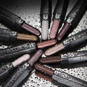 Close-up of LUXAZA PRO creamy eyeshadow sticks in neutral shades