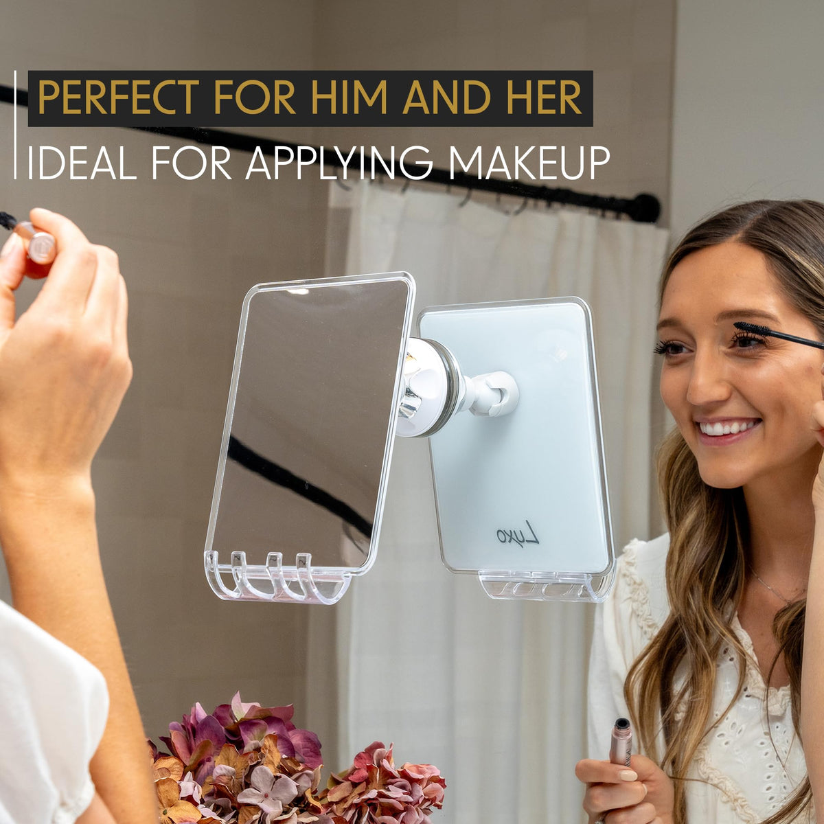 Close-up of Luxo Shower Mirror with detachable razor holder