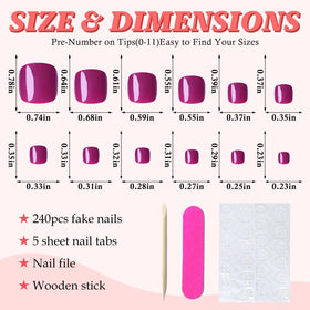 Close-up of magenta fake toenails in various sizes