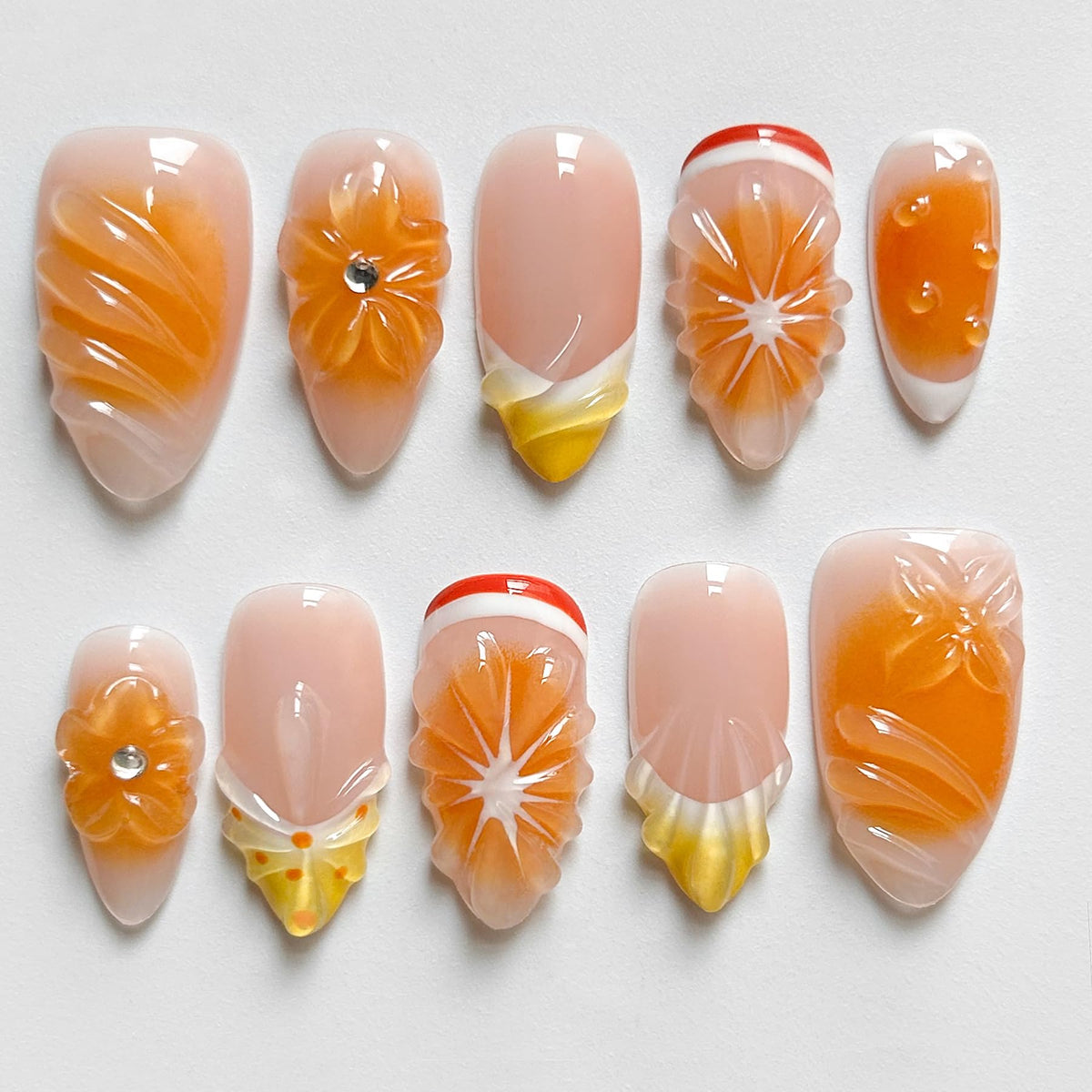 Close-up of MAGLFELL 3D Shell Press On Nails with unique patterns