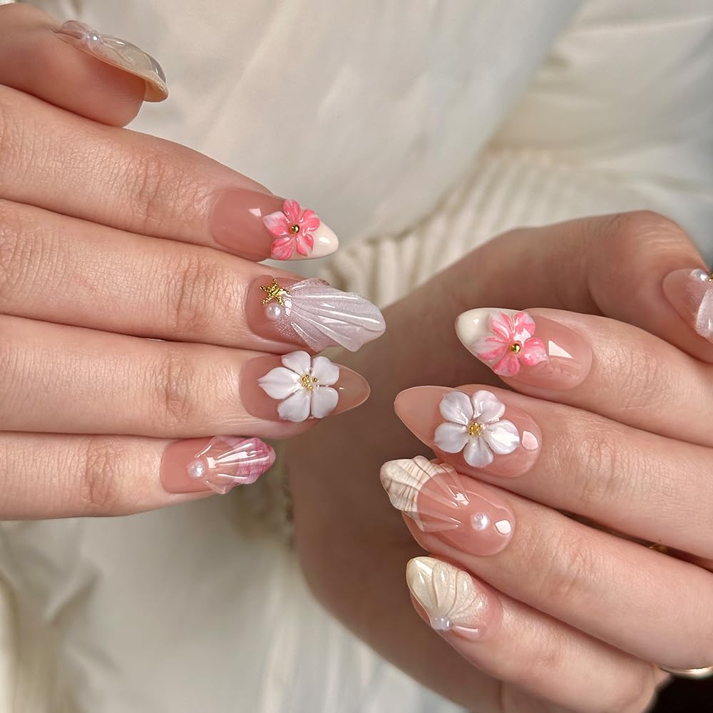 Close-up of MAGLFELL press on nails with floral pattern