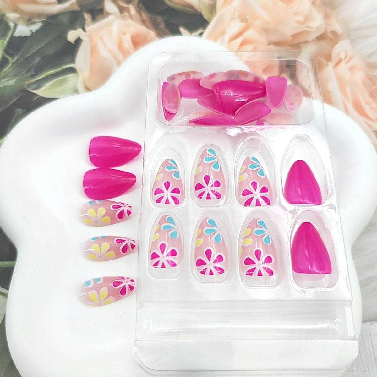 Close-up of MAOTTIE Almond Fake Nails showing flower design