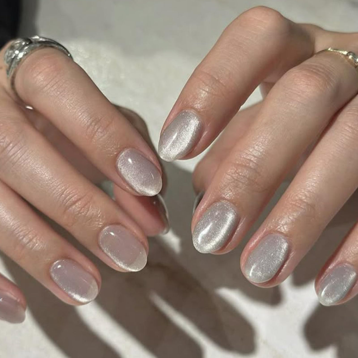 Close-up of modelones Cat Eye Press On Nails showing different sizes