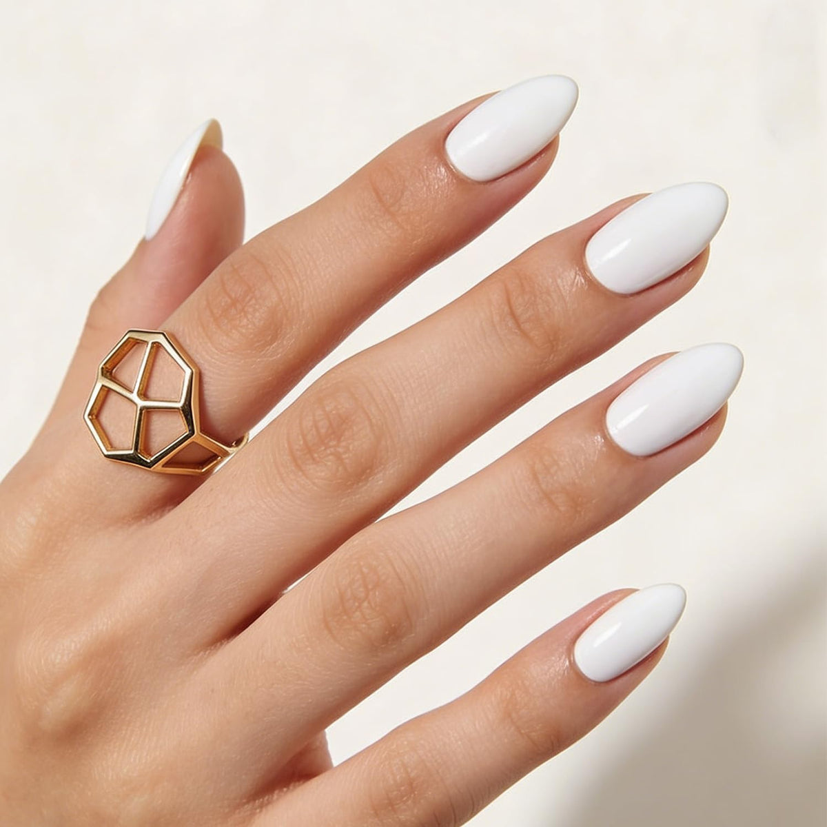 Close-up of Modelones White Press on Nails with nail glue and accessories
